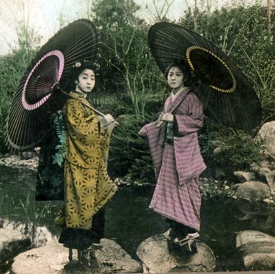 Dressed for a rainy day, c.1900 by Japanese Photographer